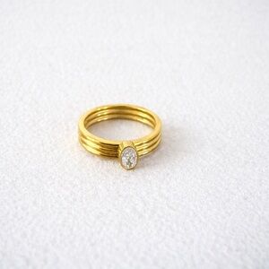 Elegant Gold-tone Ring with Clear Stone